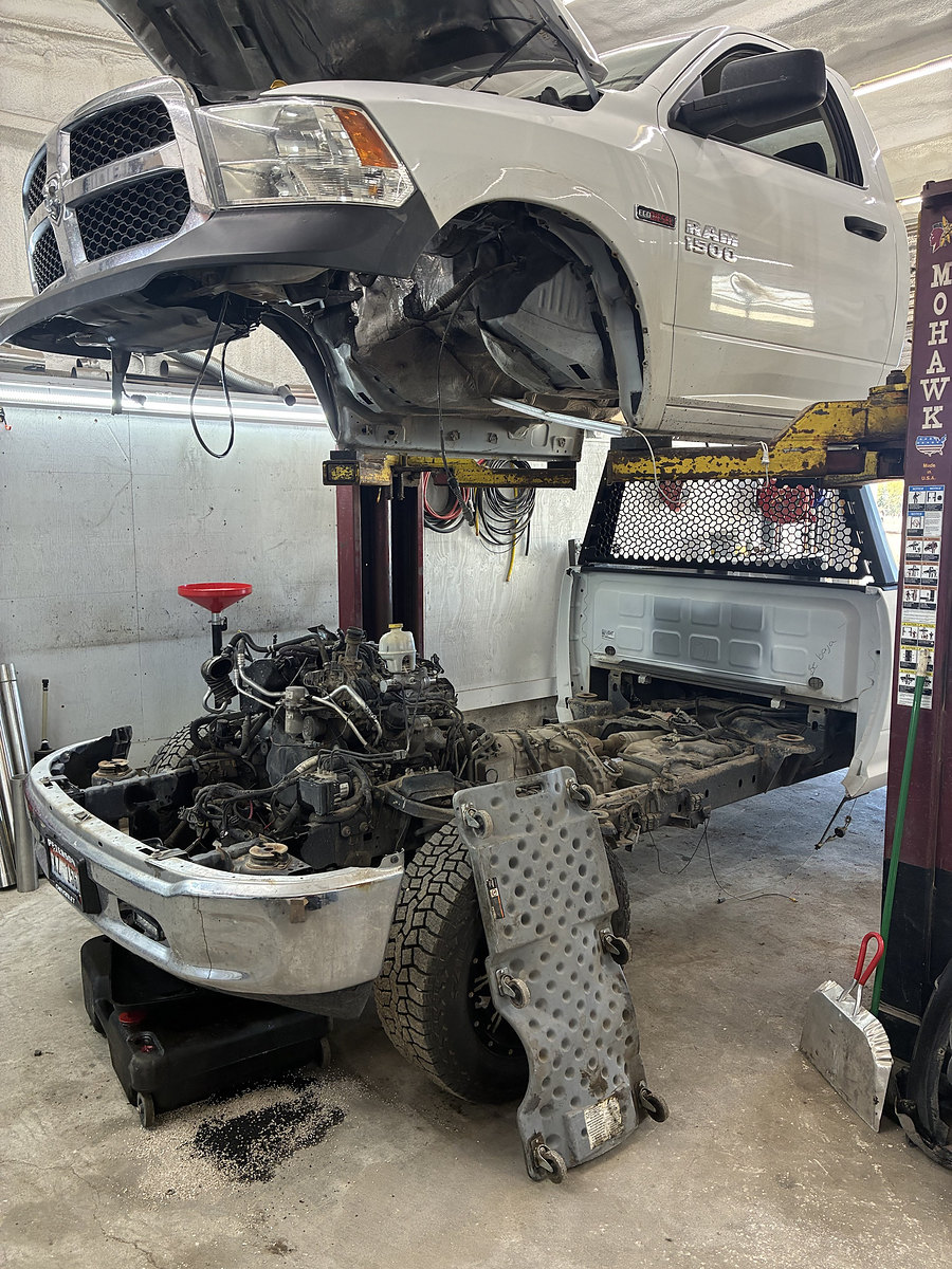 Ram 1500 EcoDiesel on a lift with the engine out